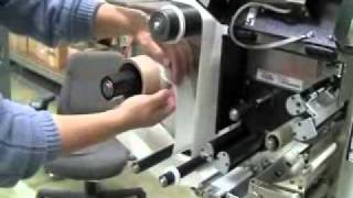 Loading labels and ribbon on a Model 5300 label applicator [upl. by Justino]