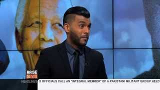 Arise America Shahan Ramkissoon Reports on Remembering Mandela 1 Year Later [upl. by Nautna996]