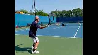 Eric Schacht practicing with the twohandled tennis racket [upl. by Anirehtak]