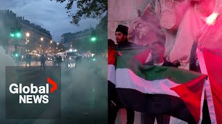 France deploys water cannons tear gas on banned proPalestinian rally as Macron urges calm [upl. by Pammie]