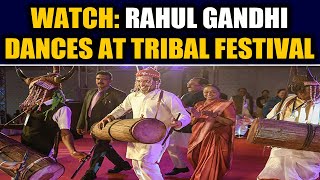 Rahul Gandhi wears traditional headgear beats drum at Chhattisgarh tribal festival Watch [upl. by Eisdnil]