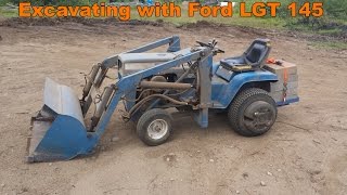 Excavating with Ford LGT 145 Garden Tractor with Front End Loader [upl. by Aihsenrad]