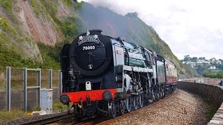 BR 70000 Britannia powers through Devon on the last Torbay Express 130915 [upl. by Ahsiuqal]