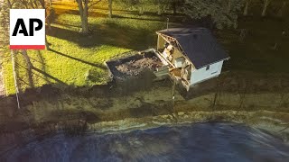 WATCH Video captures house collapsing into water next to Minnesota dam [upl. by Avivah919]