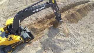 Volvo EW205D Wheeled Excavator promotional video [upl. by Eleanora684]