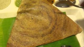 Rava Kichadi or Uppma amp Vegetable Dosai at Saravana Bhavan restaurant P13 Connaught Circus New Delhi India 26th February 2012 [upl. by Broeker]