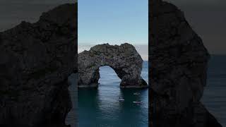 Spectacular Durdle Door at 6 am stunningdrone durdledoor views fun happy travel sun water [upl. by Romalda624]