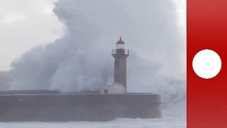 Atlantic storm Huge waves crash into lighthouse in Portugal [upl. by Nalra]