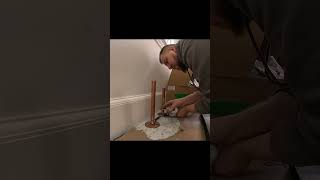 Installing tub filler plumbing plumber plumbingservices tradesman bathroom shorts short [upl. by Javier]