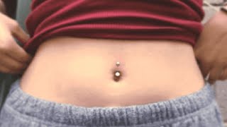 why does my belly button piercing keep bleeding fast [upl. by Arotahs831]