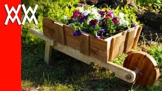 Make a rustic wheelbarrow garden planter Easy DIY weekend project [upl. by Boeke407]