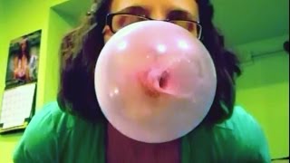 Cute Girl In Glasses Blowing Bubble Gum Bubbles 2 [upl. by Lellih]