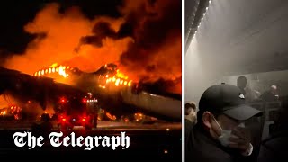 Japan Airlines fire Passenger jet bursts into flames in Tokyo [upl. by Delle]