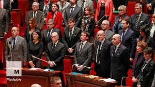 After moment of silence politicians sing French national anthem to honor attack victims  Mashable [upl. by Enasus]