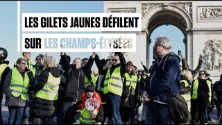 A Paris des gilets jaunes ont défilé sur les ChampsElysées [upl. by Bergh]