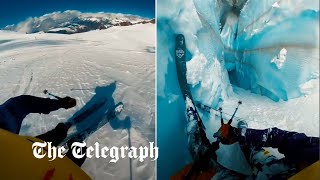 Skier falls down deep glacier cliff and only narrowly avoids falling into the abyss [upl. by Tocci]