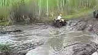 Honda Forman tearing up a mud hole [upl. by Fabria]