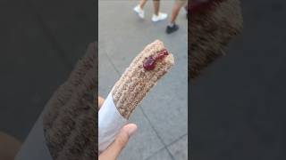 Boysenberry fruit stuffed cinammon covered fresh churro  Knotts Berry Farm California 9142024 [upl. by Noired118]