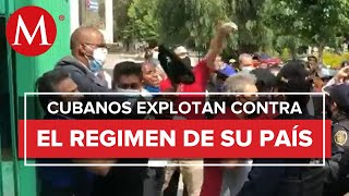 Manifestantes chocan en embajada de Cuba en México [upl. by Coffin]