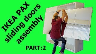 IKEA PAX WARDROBE Sliding doors assembly Part 2 [upl. by Yentruoc]