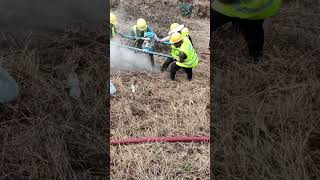 Workers working on the hillside [upl. by Collbaith]