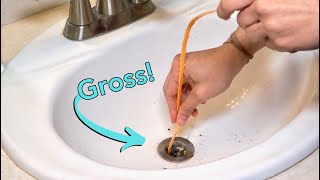 How to Clean a Clogged Sink amp Remove Stopper [upl. by Nygem]