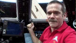 Hadfield behind the controls of Canadarm2 [upl. by Suivatco]