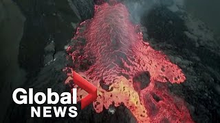 Giant boulders float down rivers of lava from La Palma volcano eruption [upl. by Eadahc]