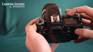 How to change metering mode between spot center weighted and matrix on the Nikon D7100 [upl. by Yenittirb]