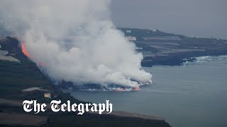 La Palma volcano lava hits the sea as residents warned about toxic gases [upl. by Inahs329]