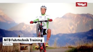 MTB Fahrtechnik Training 10 Mountainbike Wheelies Tutorial [upl. by Lrigybab516]