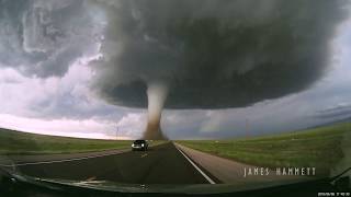 Storm chasing dashcam Tornado crossing the highway Laramie Wyoming [upl. by Avril838]