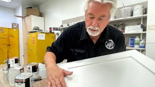 Spray Painting The Perfect White Finish For Cabinets [upl. by Darnall]