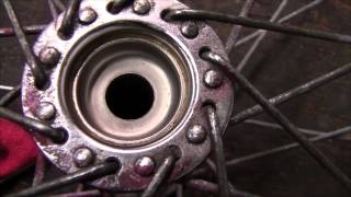 How to Rebuild and Repair a Wheel Bearing on a Bicycle [upl. by Nealson756]