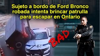 Sujeto a bordo de Ford Bronco robada intenta brincar patrulla para escapar [upl. by Rog]