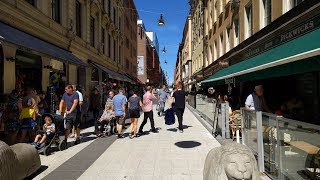 Drottninggatan pedestrian street in Stockholm Sweden [upl. by Donnell]