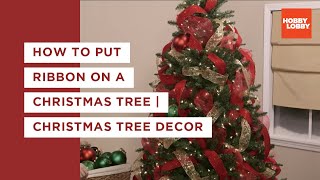 How to Put Ribbon on a Christmas Tree  Christmas Tree Decor  Hobby Lobby® [upl. by Aohsoj351]