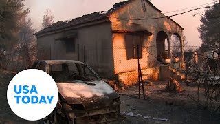 Residents in Greece return to damaged properties after wildfire  USA TODAY [upl. by Tsan]