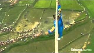 Acrobat falls off tightrope in death defying high wire stunt gone wrong [upl. by Eeleak]