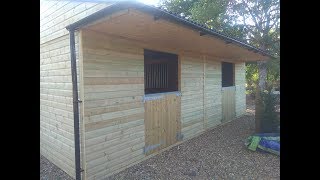 Building a wooden horse stables Stable Build Company [upl. by Attenol123]