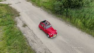 My red Citroën 2CV followed by DJI Mini 4 PRO drone in Almere [upl. by Yrennalf629]