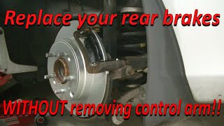 Hyundai mechanic replaces rear brakes on a 20112014 Hyundai Sonata WITHOUT removing control arm [upl. by Beaston]