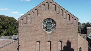 Dronebeelden van De St Werenfriduskerk en parochiehuis Lange versie [upl. by Ahsenek957]