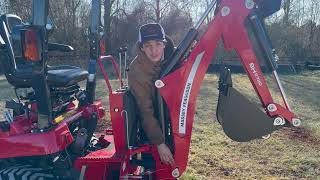 How to operate a backhoe on a Massey Ferguson Tractor [upl. by Ilatfan166]