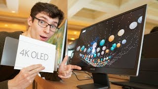 A 4K OLED Monitor Thats NOT a Prototype – Asus PQ22UC  CES [upl. by Daniel]