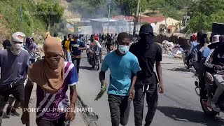 Tear gas deployed at protesters in Haiti capital as gang violence continues [upl. by Noswad]