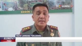 TNI Turunkan dan Sita Bendera Palu Arit di Manado [upl. by Imit485]