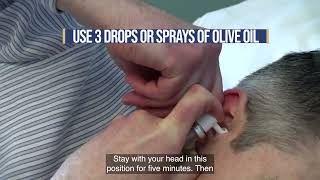 Using olive oil to treat a build up of ear wax [upl. by Blondy335]