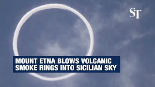 Mount Etna blows rare volcanic vortex smoke rings Into Sicilian sky [upl. by Anafetse232]