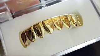 14k Gold Plated Eight Tooth Bottom Grillz [upl. by Gnov]